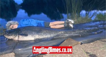 Schoolboy catches brace of catfish bigger than him